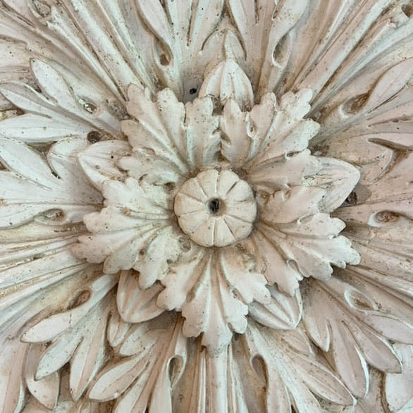 Decorative floral ceiling medallion with intricate details