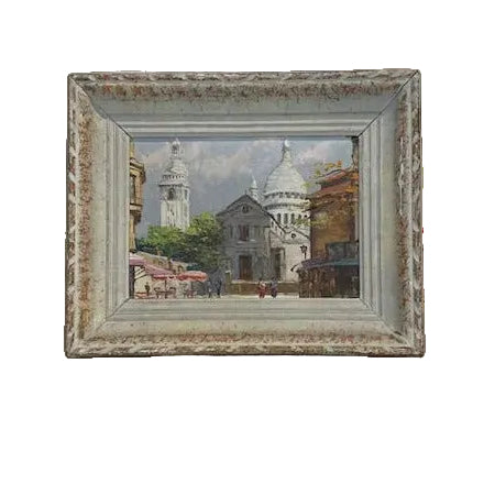 Framed oil painting depicting a view of Place du Terre, with a vintage-style frame.
