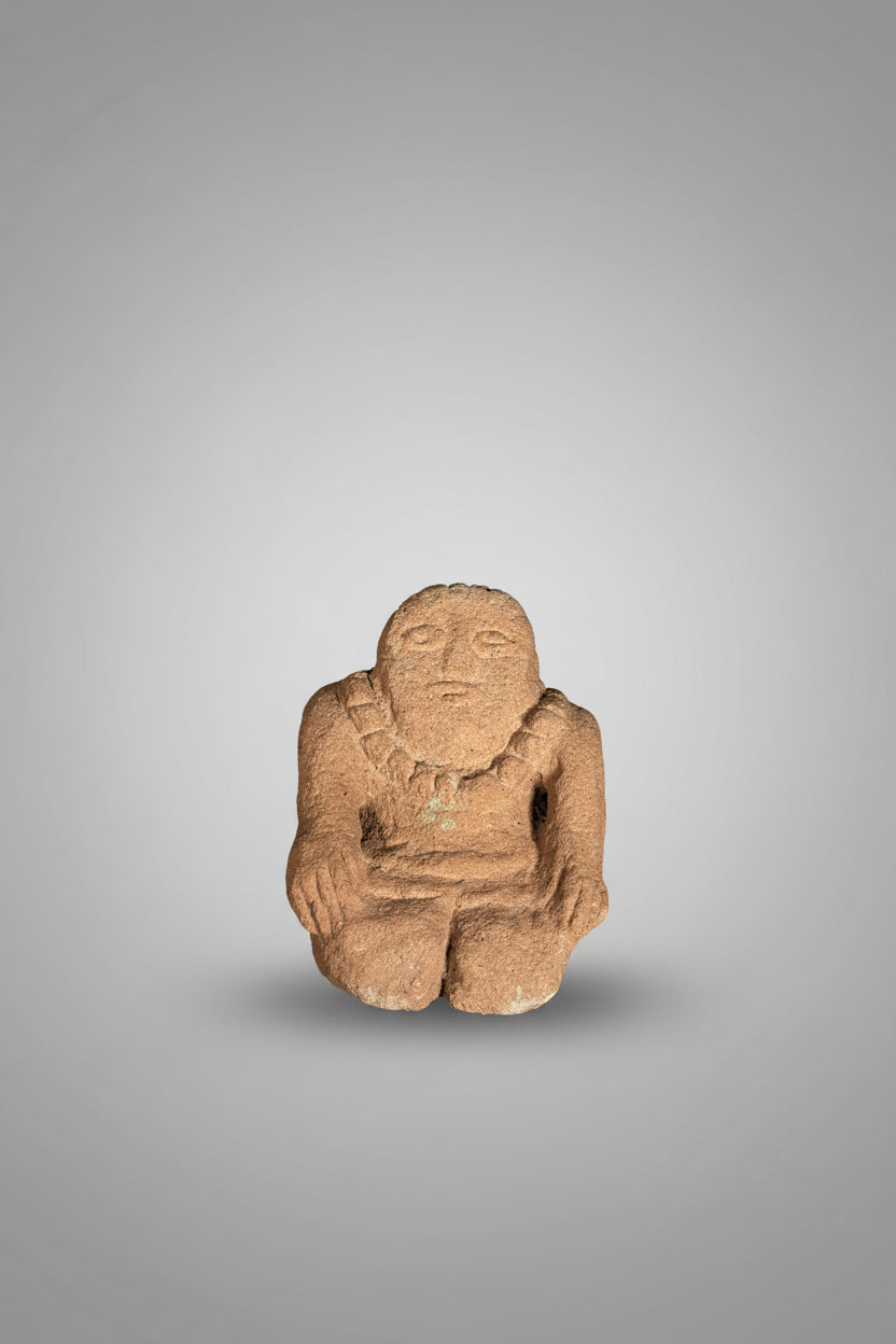 Carved Stone Figure