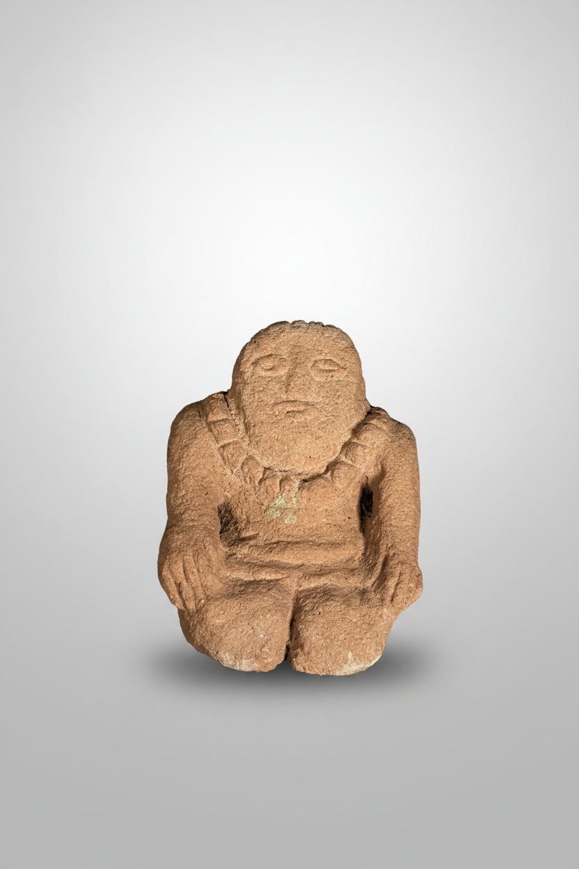 Carved Stone Figure