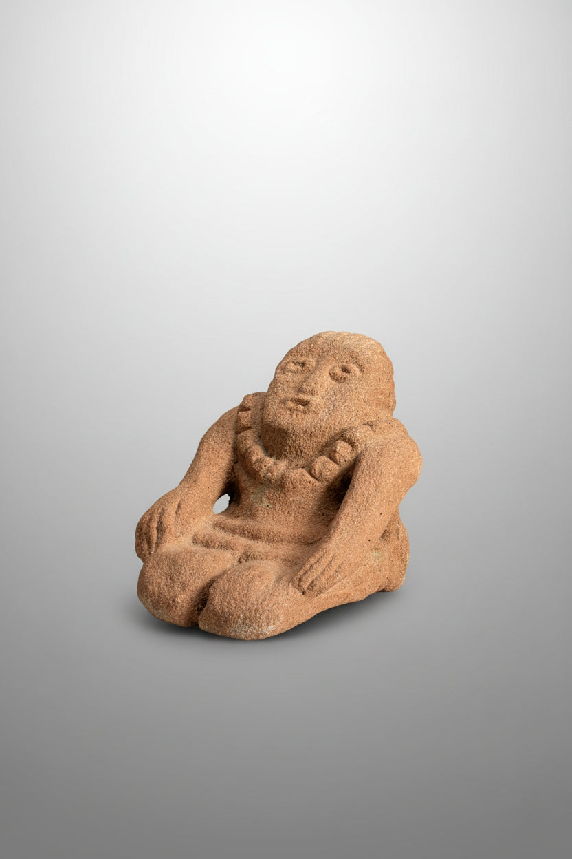 Carved Stone Figure