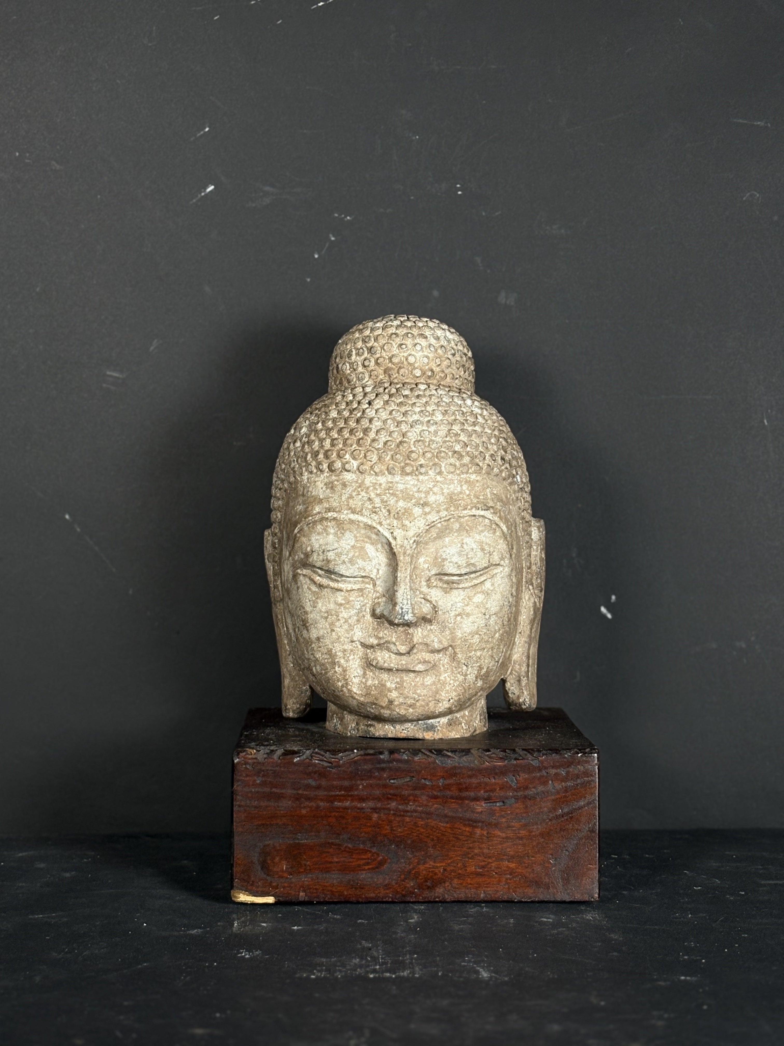 Carved Stone Head with Bun