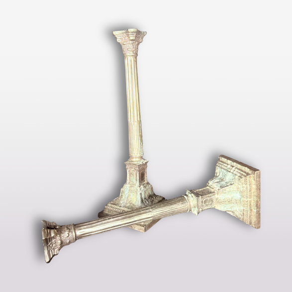 A pair of vintage-style wall-mounted candlestick holders designed as classical columns, featuring a vertical pillar and a horizontal arm with a decorative base, shown against a light gray background.
