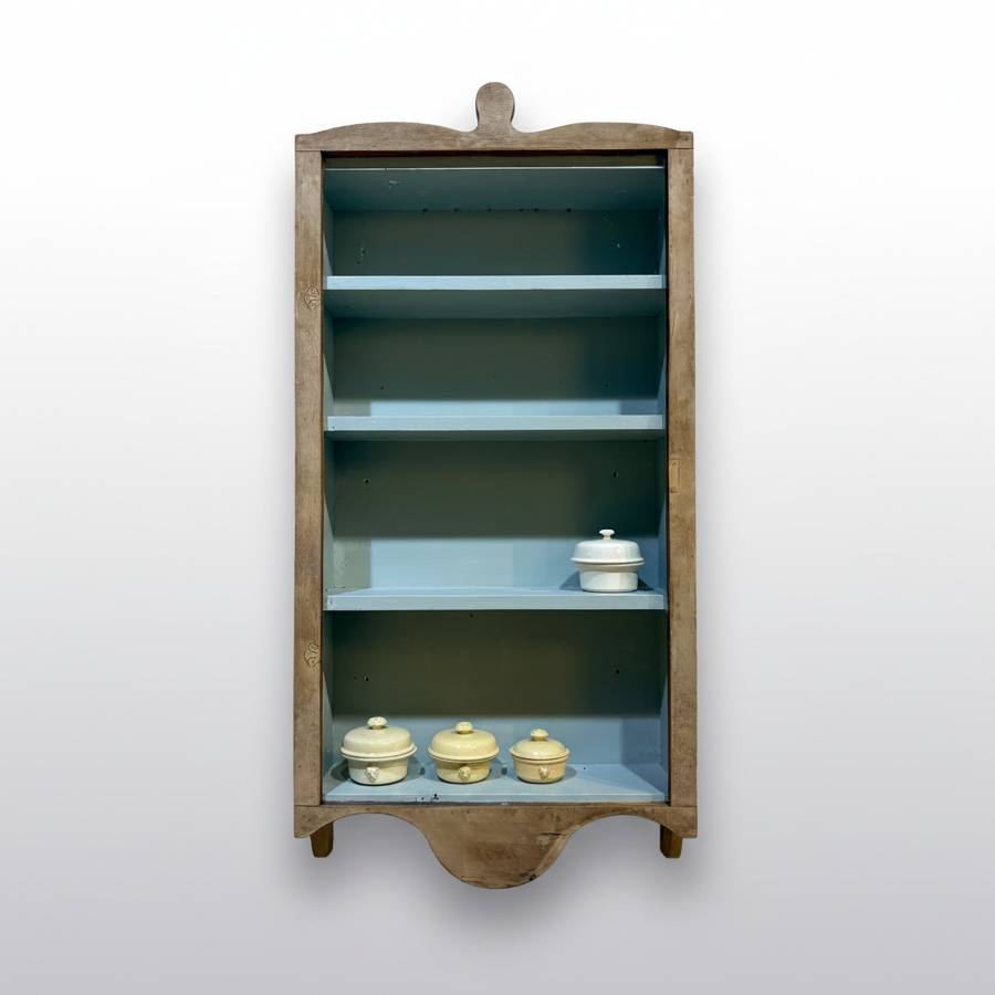 Wooden drawer with compartments on a white background