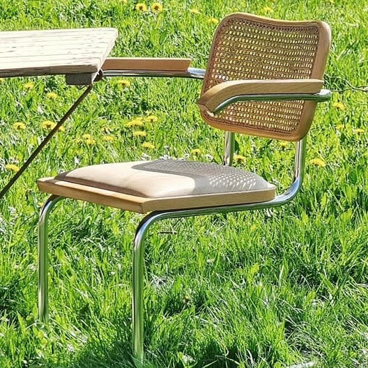 Cane Back Arm Chair with Blush Faux Leather Seat Pad