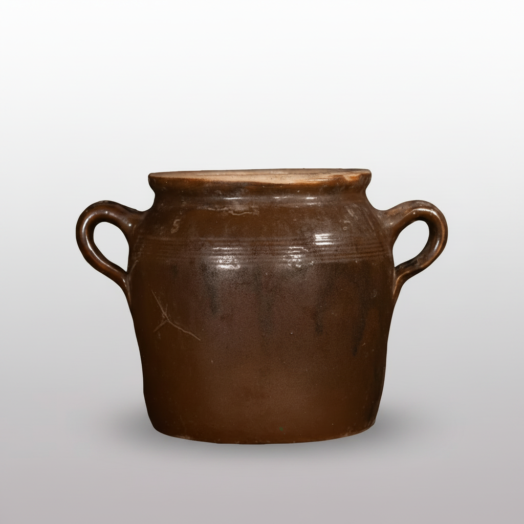 Brown ceramic jar with two handles on a dark background