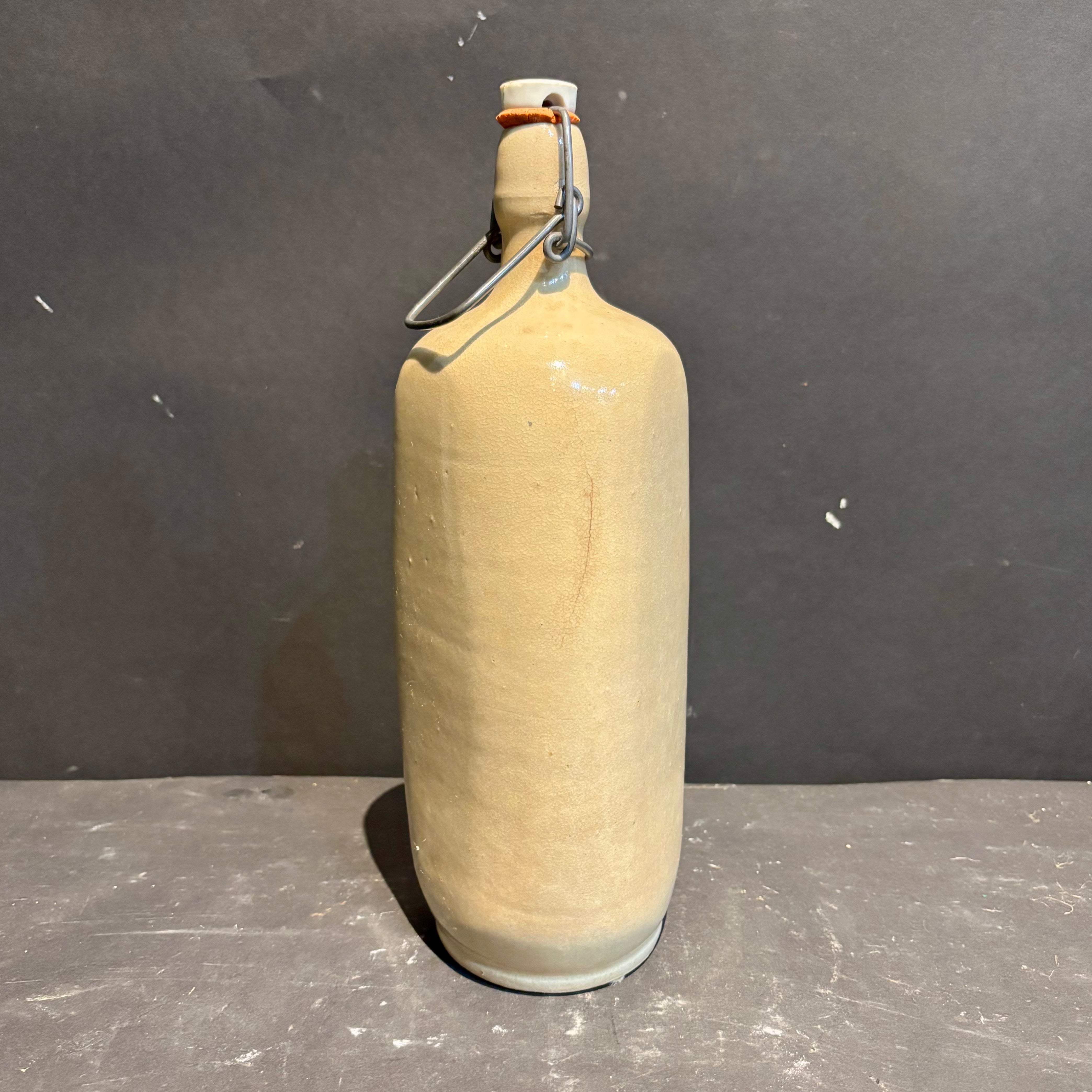 1925 Triangular Sandstone Bottle with Lid