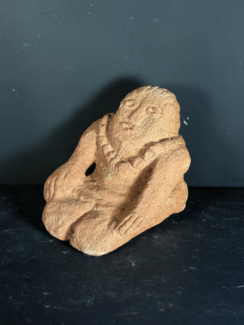 Carved Stone Figure