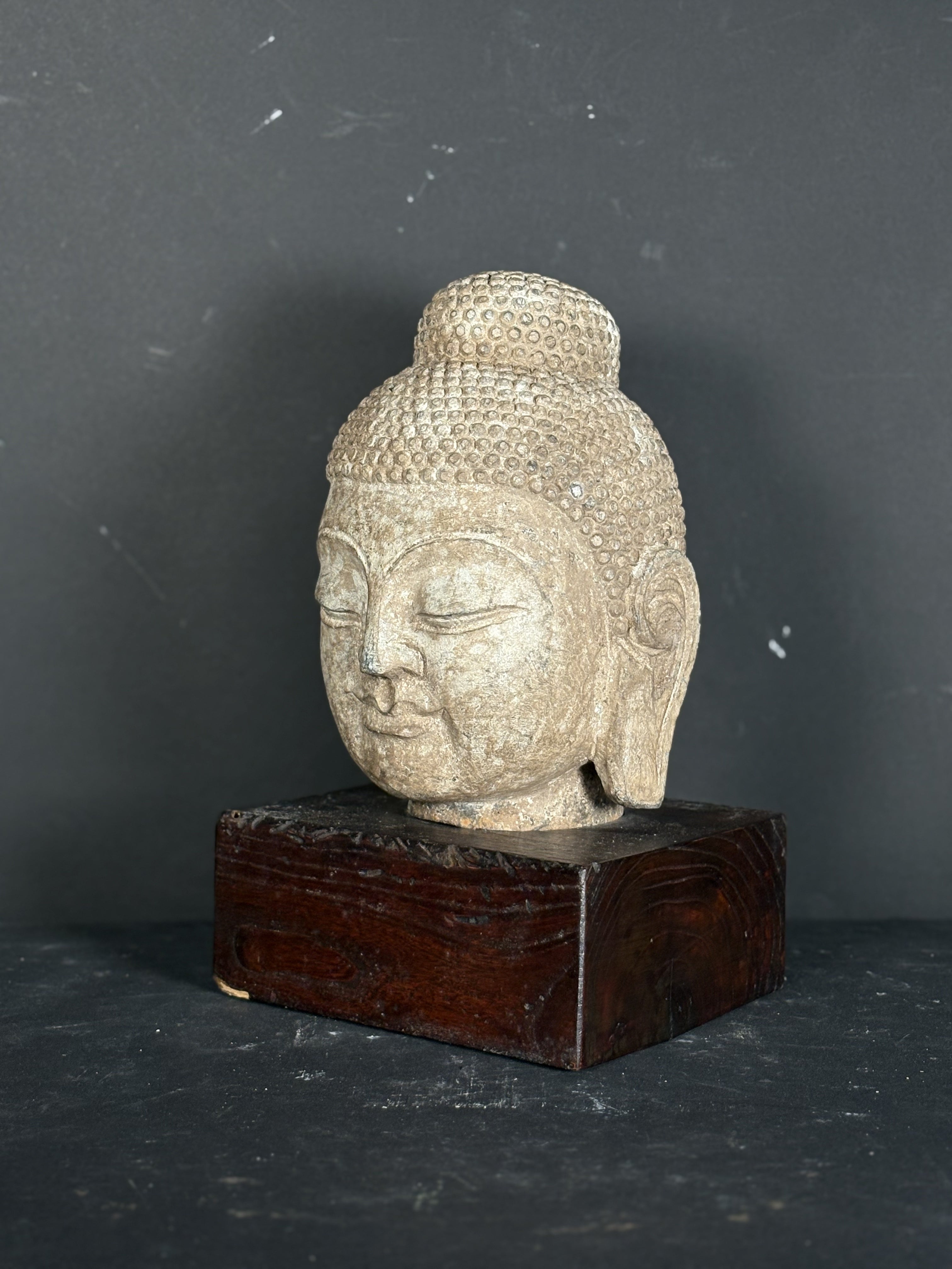 Carved Stone Head with Bun