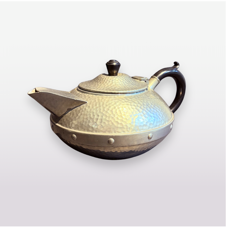 Sheffield Arts and Crafts teapot in hammered pewter