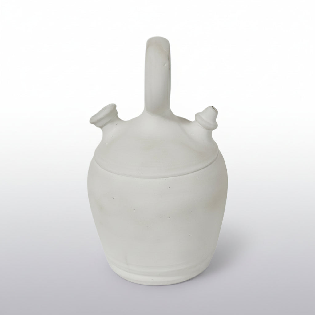 A charming antique French gargoulette from Provence, crafted in pale, unglazed terracotta with a softly weathered surface.