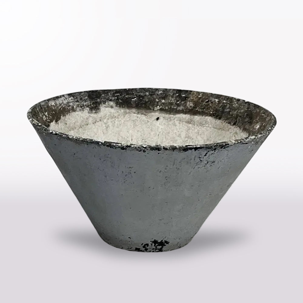 A large planter in cast concrete, its bold conical form and footless base in the minimalist, sculptural style of designer Willy Guhl.